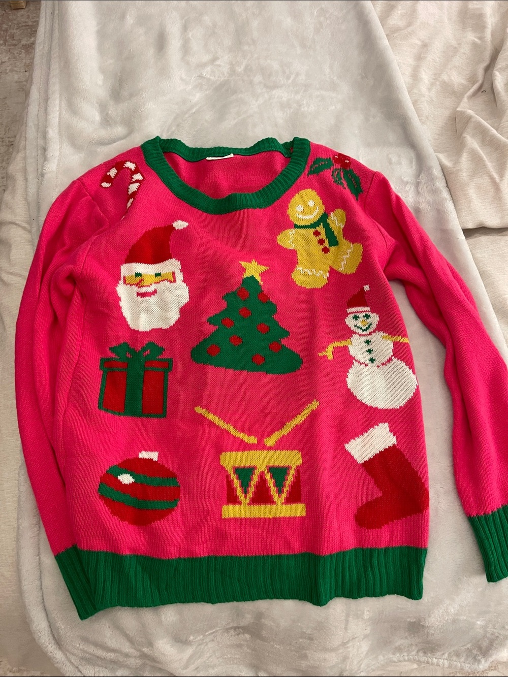 Festive Pink Christmas Sweater with Holiday Motifs